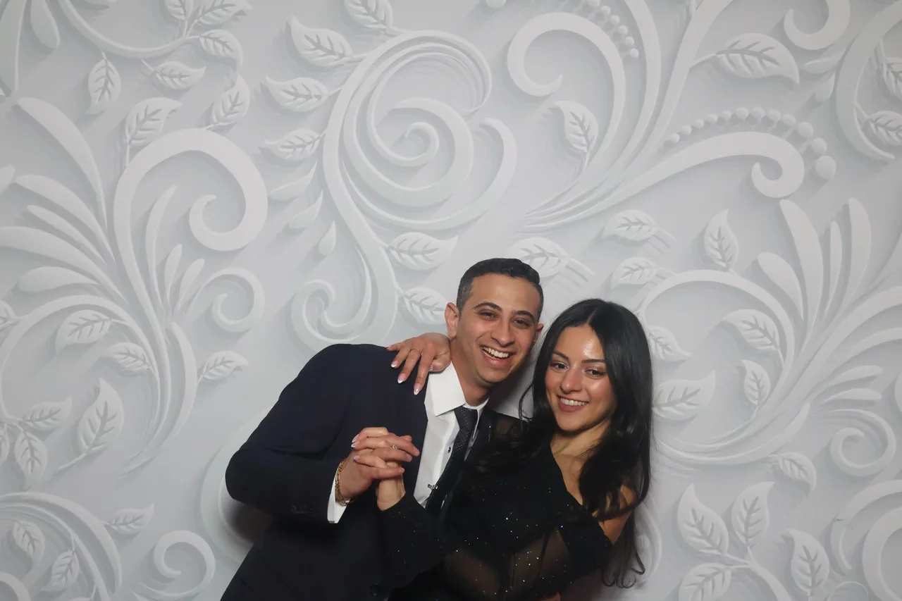 Guests enjoying a Golden Captures photo booth rental — event photo 13