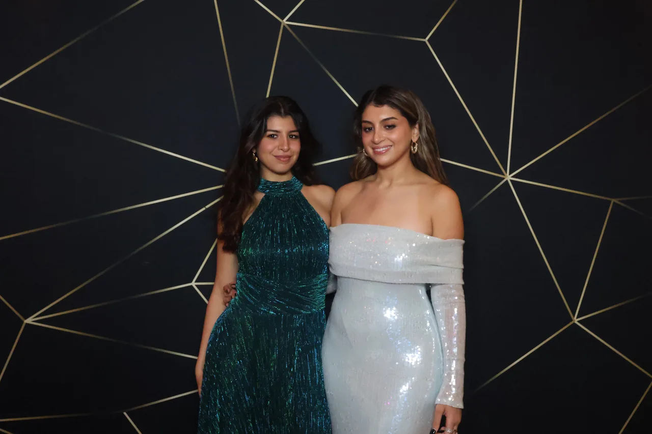 Guests enjoying a Golden Captures photo booth rental — event photo 14