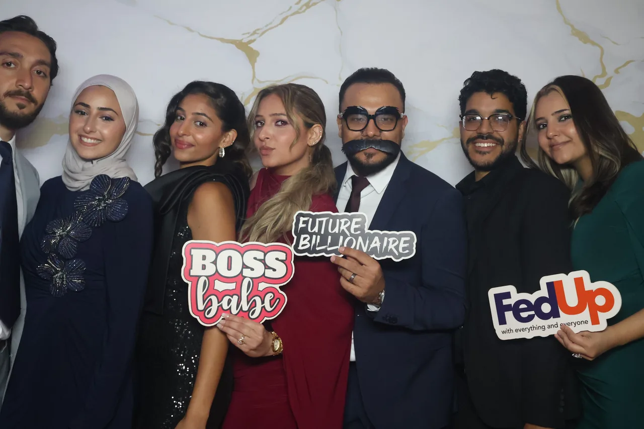 Guests enjoying a Golden Captures photo booth rental — event photo 15