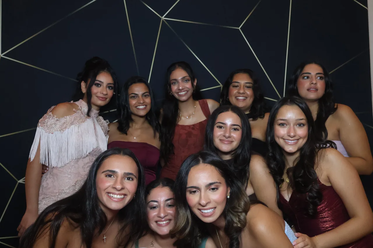 Guests enjoying a Golden Captures photo booth rental — event photo 16