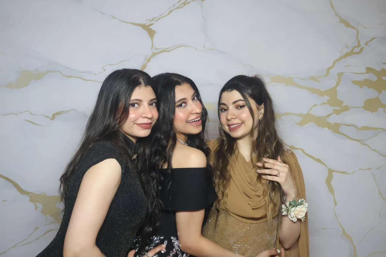 Guests enjoying a Golden Captures photo booth rental — event photo 22