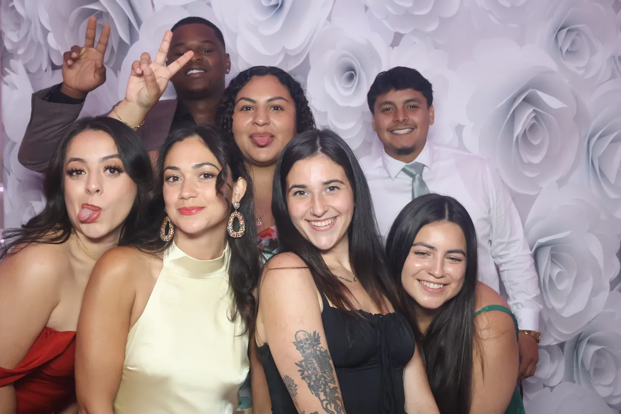 Guests enjoying a Golden Captures photo booth rental — event photo 26