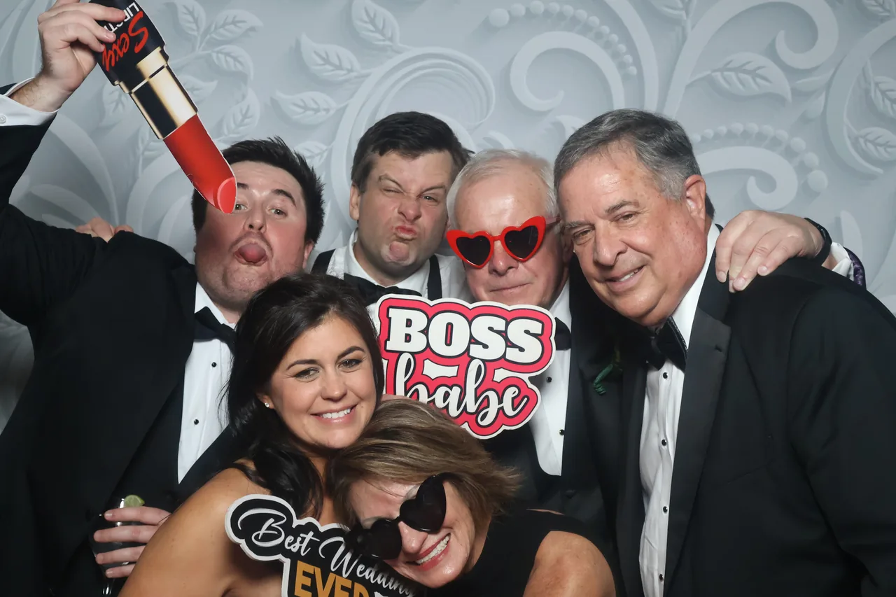 Guests enjoying a Golden Captures photo booth rental — event photo 32