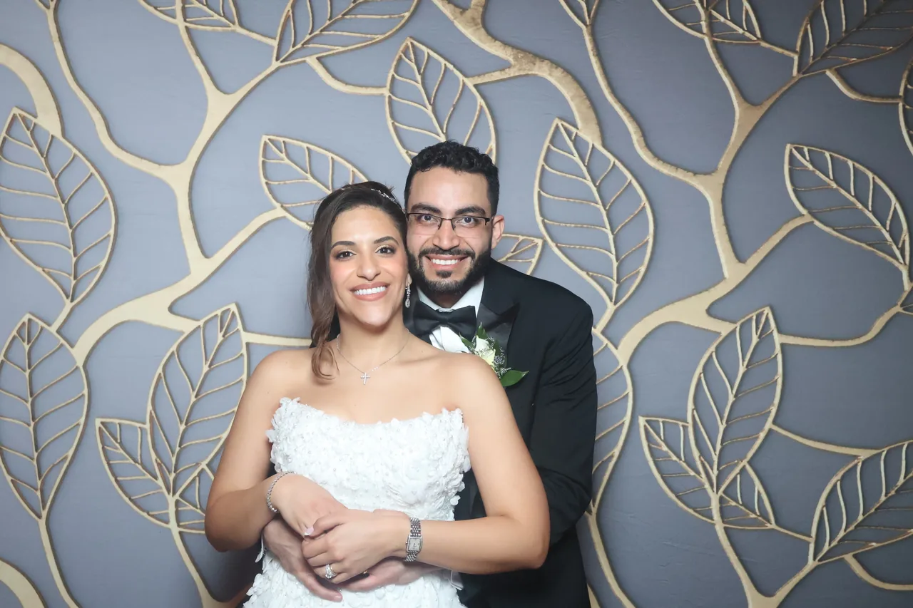 Guests enjoying a Golden Captures photo booth rental — event photo 33