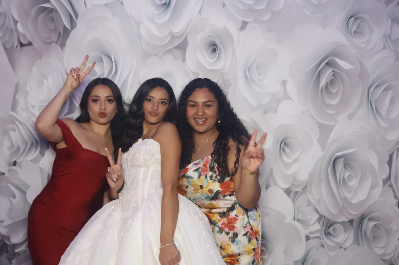 Guests enjoying a Golden Captures photo booth rental — event photo 35