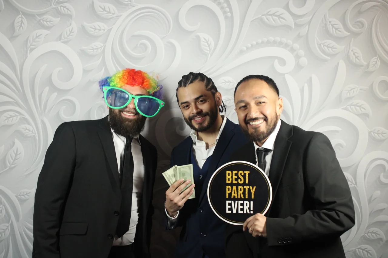 Guests enjoying a Golden Captures photo booth rental — event photo 7