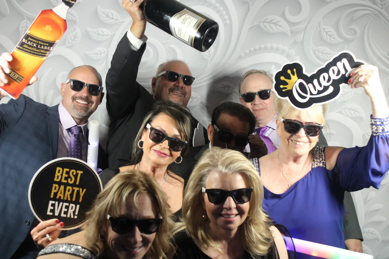 Guests enjoying a Golden Captures photo booth rental — event photo 8
