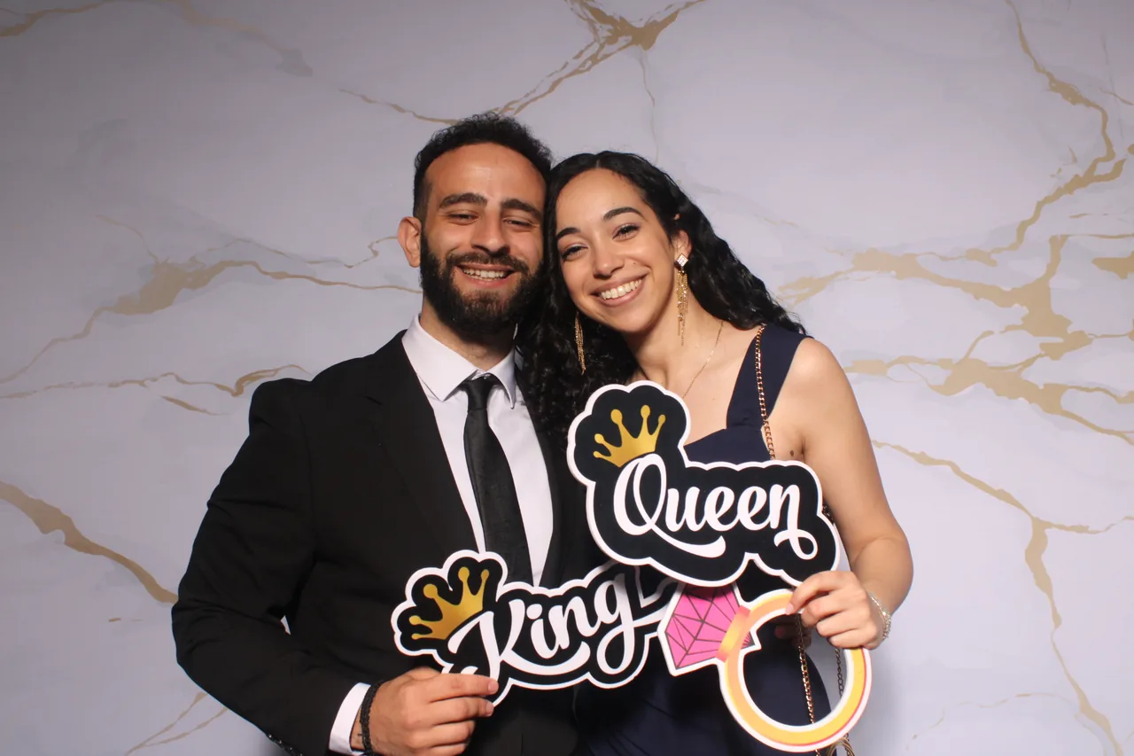 Guests enjoying a Golden Captures photo booth rental — event photo 9